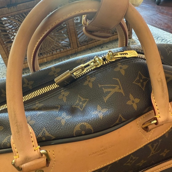 Louis Vuitton canvas rolling duffle bag, gently used. - Picture 7 of 14
